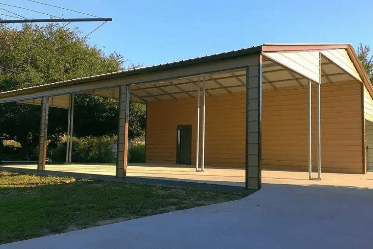 A wide continuous roof metal barn with ample space for storage