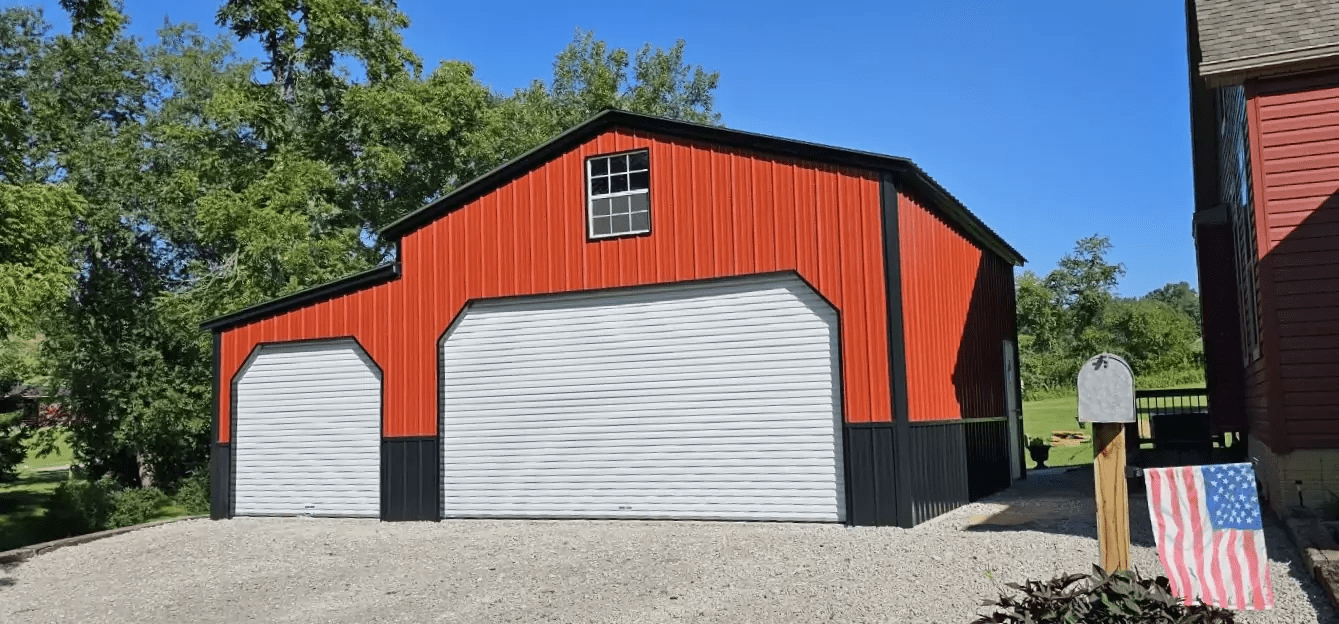 Metal garage besides the house