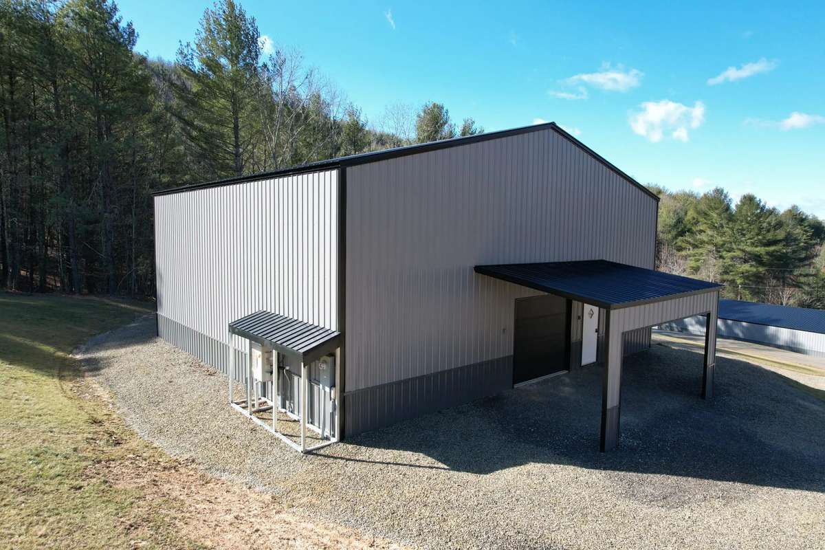 A one-door commercial metal building, ideal for storage purposes. 