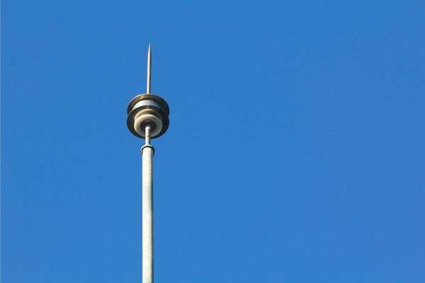 A lightning rod on a metal building