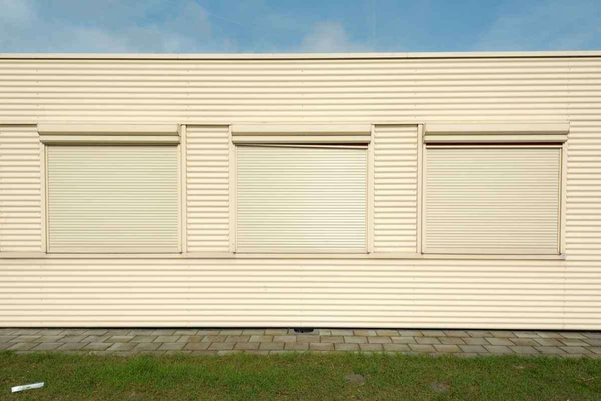 Metal building homes with metal shutters