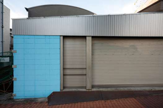 Prefabricated metal garages featuring modern steel construction and contemporary design elements.